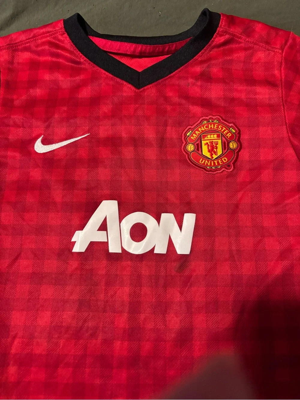 Nike Kids Red Manchester United Jersey with Black Trim